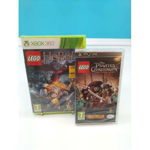 163 - Factory Sealed LEGO The Hobbit XBOX 360 Game plus PSP LEGO The Pirates of the Caribbean.