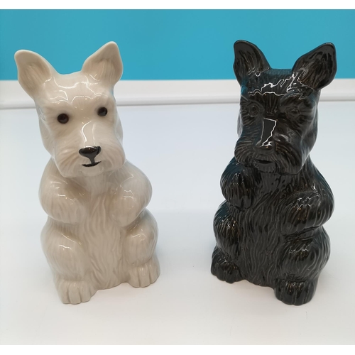 172 - Wade Black and White Scottie Dog Money Boxes. 16cm Tall.