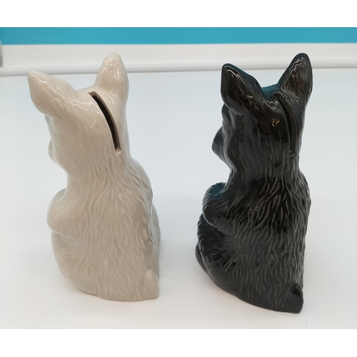 172 - Wade Black and White Scottie Dog Money Boxes. 16cm Tall.