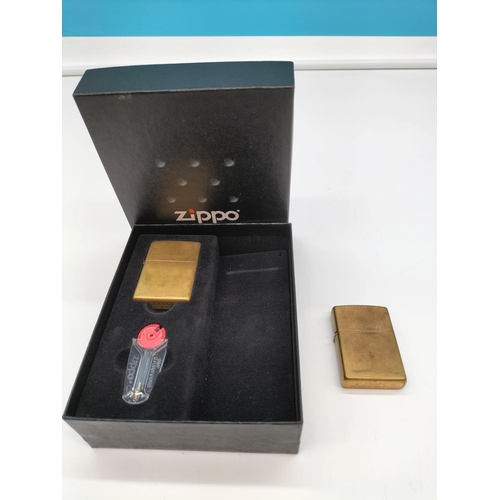 187 - Zippo Brass Lighters (2). One Boxed.