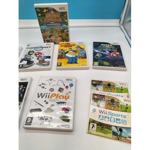 190 - Nintendo Wii Games (10) including Mario Kart, Animal Crossing, Super Mario Galaxy, Wii Sports, etc.