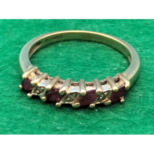 317 - 9ct Gold Ruby and Diamond Ladies Ring. Size P. 2.5 Grams.