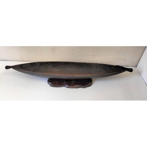 1 - Carved Wooden Native Boat on Stand. 11cm High, 98cm x 18cm.