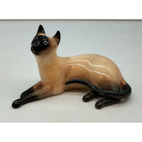 126 - Royal Doulton Figure of a Siamese Cat. Slight Nip to Ear. Seconds Quality. 8cm High x 15cm.