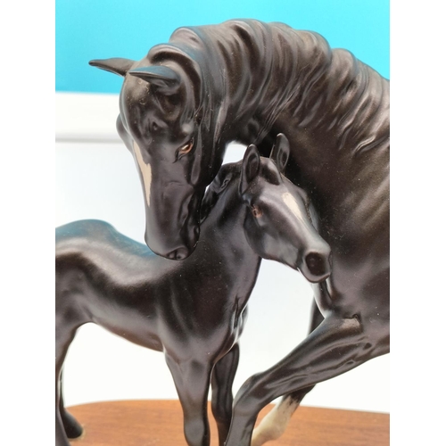 136 - Beswick Connoisseur Collection Figure of Black Beauty and Foal. 20cm x 30cm.