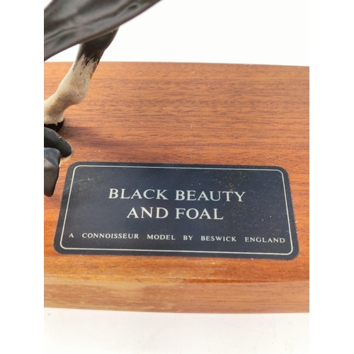 136 - Beswick Connoisseur Collection Figure of Black Beauty and Foal. 20cm x 30cm.