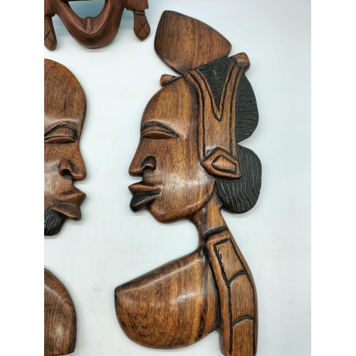 171 - African Wooden Wall Plaques (2) plus Wooden Face Mask. 33cm Tall.