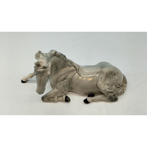 21 - Beswick Figure of a Dapple Grey Lying Down Horse. 13cm High x 26cm.