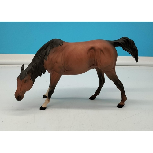 23 - Beswick Matt Figure of a Grazing Horse. 15cm High, 26cm Long.