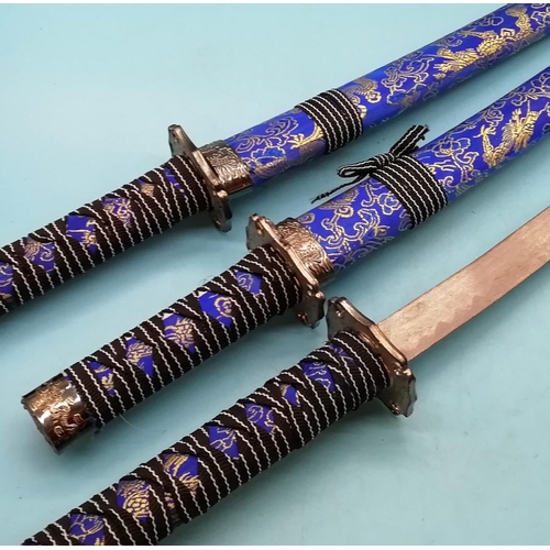 243 - Decorative Samurai Swords (3). One without Sheath. Over 18 ID Required.