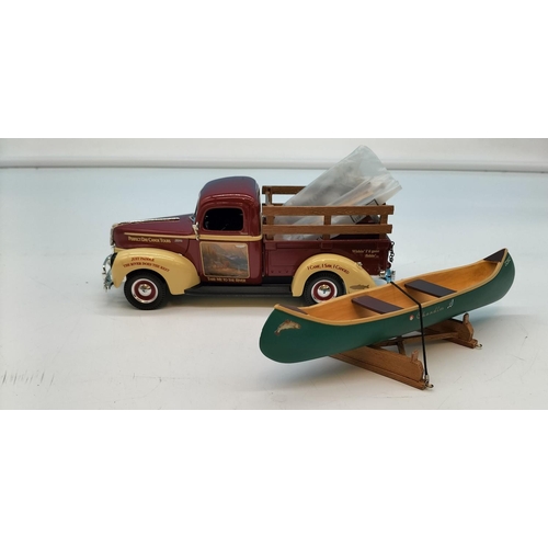 318 - ERTL 1940's Pick Up 'Perfect Days Canoe Tours' with Canoe. Oars A/F. 12cm high x 19cm.