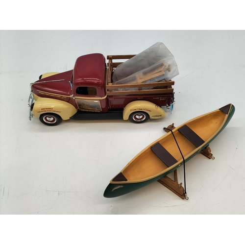 318 - ERTL 1940's Pick Up 'Perfect Days Canoe Tours' with Canoe. Oars A/F. 12cm high x 19cm.