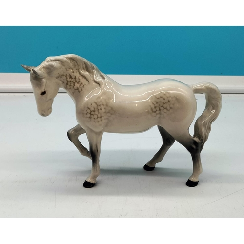 52 - Beswick Dapple Grey Prancing Horse. Tail Re-glued. 15cm High x 22cm.