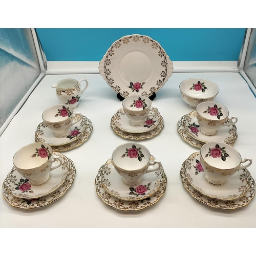 56 - Roslyn Fine Bone China 21 Piece Part Tea Ser in a Pink Rose and Gilding Pattern.