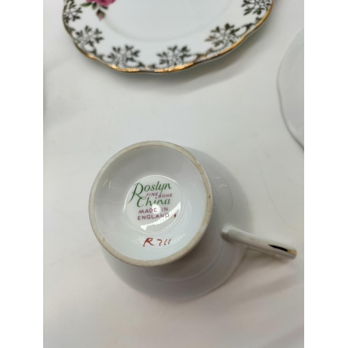 56 - Roslyn Fine Bone China 21 Piece Part Tea Ser in a Pink Rose and Gilding Pattern.