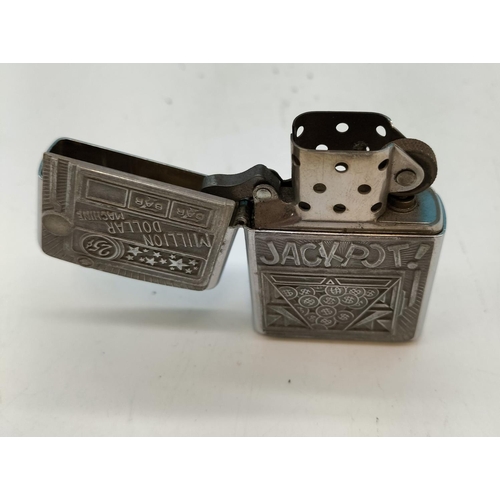 Zippo Lighter with 'Million Dollar Machine' Jackpot Design.