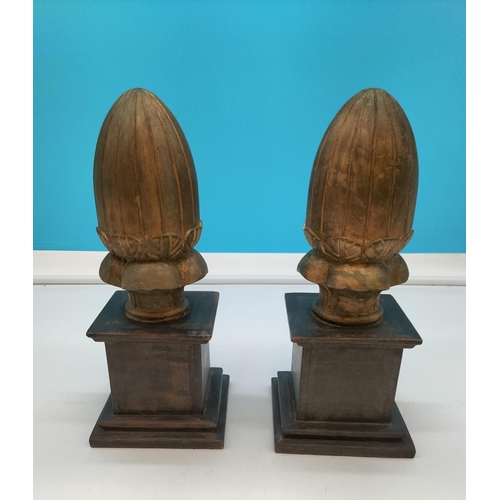 86 - Pair of Wooden Carved Acorns on Plinths. 28cm Tall. Made in India.