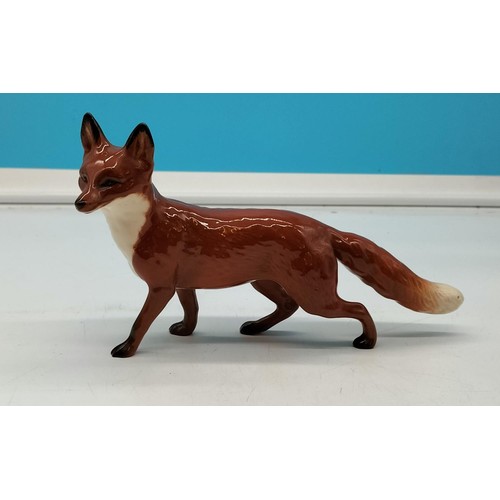 4 - Beswick Model of a Standing Fox. 13cm High, 24cm Long.