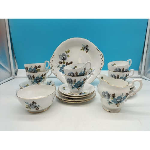 36 - Royal Standard Fine Bone China 21 Piece Part Tea Set in a 'Blue Rose' Pattern.