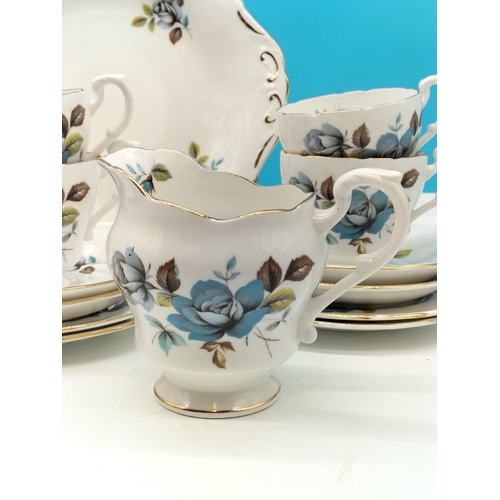 36 - Royal Standard Fine Bone China 21 Piece Part Tea Set in a 'Blue Rose' Pattern.