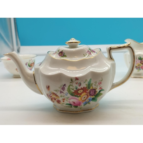 38 - Coalport Teapot, Milk Jug and Sugar Bowl in the 'Junetime' Pattern.