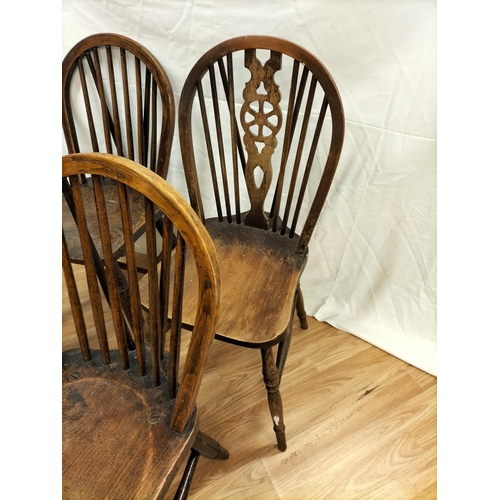 784 - 2 x Wheel Back Wooden Chairs plus 2 x Spindle Back Chairs. This Lot is Collection Only.