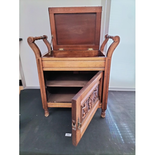 719 - Oak Piano Stool with Carved Wood Panelled Door and Music Sheet Drawer. 61cm High, 34cm x 58cm. This ... 