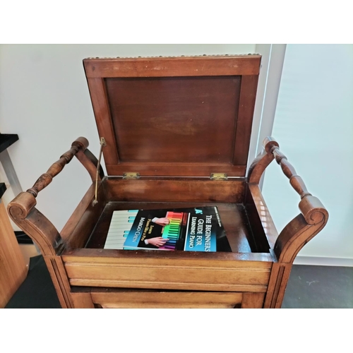 719 - Oak Piano Stool with Carved Wood Panelled Door and Music Sheet Drawer. 61cm High, 34cm x 58cm. This ... 