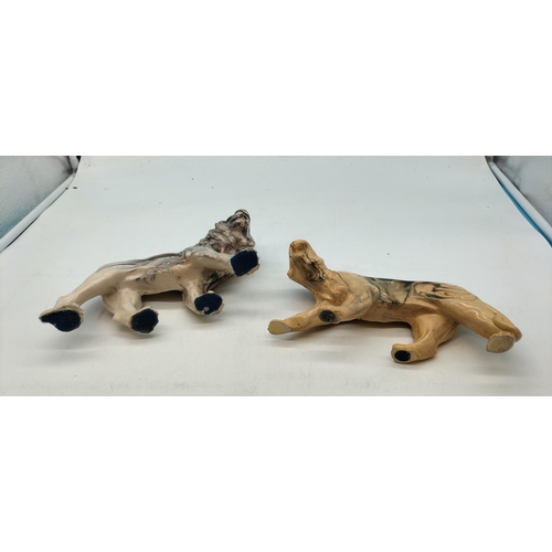 211 - Resin Marble Effect Lion and Lioness Figures. Largest being 23cm x 13cm.