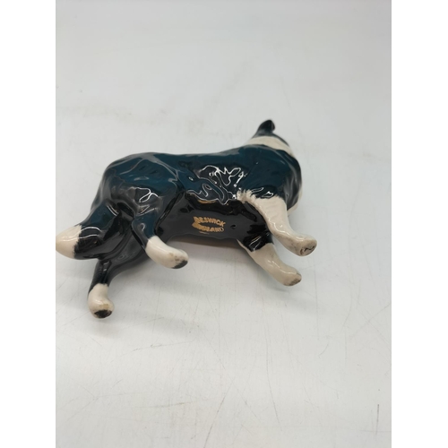 217 - Beswick Figure of a Collie Dog with Gold Stamp. 11cm x 8cm.