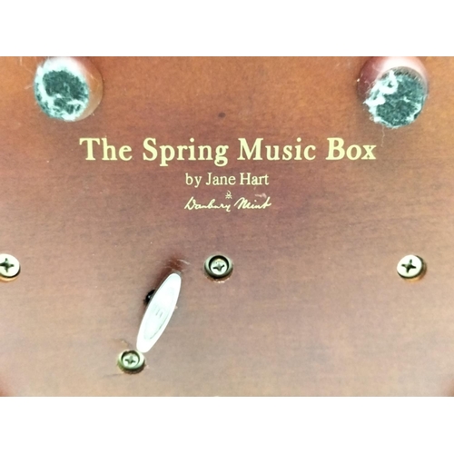 383 - 'The Spring Music Box' by Jane Hart. W/O. 11cm High, 19cm x 15cm.