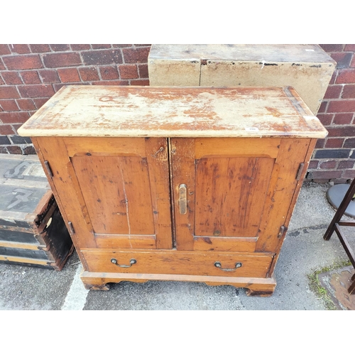 390 - Pitch Pine 1 Drawer, 2 Door Storage Cabinet. 94cm High, 95cm x 39cm. This Lot is Collection Only.