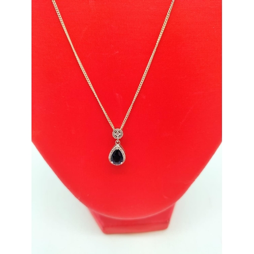 703 - 925 Silver Necklace and Pendant with Cubic Zirconia Blue Stone.