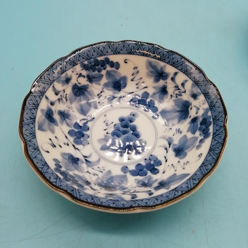 706 - 20th Century Japanese Blue and White Floral Bowls (6). Differing Character Marks. 11cm Diameter.