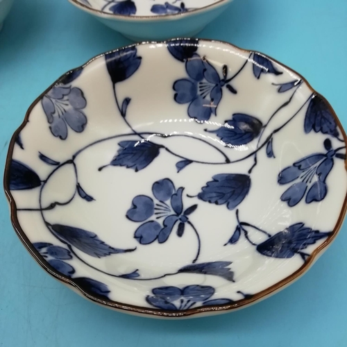 706 - 20th Century Japanese Blue and White Floral Bowls (6). Differing Character Marks. 11cm Diameter.