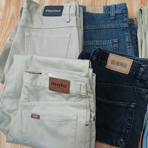 709 - 9 Pairs of Men's Trousers to include M & S, Gap, Hawkshead, Burtons, Moto and Principles. Waist Size... 