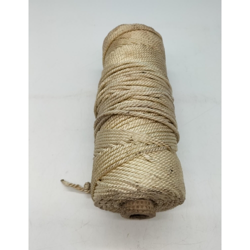 726 - Roll of 5mm Diameter Cord/String. Roll measures 29cm long and has a Diameter of 10cm.