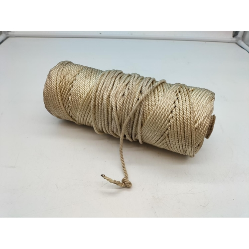 726 - Roll of 5mm Diameter Cord/String. Roll measures 29cm long and has a Diameter of 10cm.