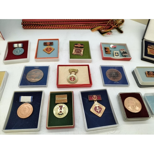 47 - Large Collection of German DDR Awards and Medals complete with Certificates and Other Ephemera. (Pre... 