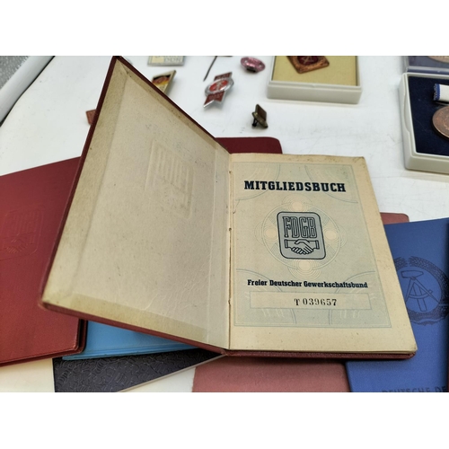 47 - Large Collection of German DDR Awards and Medals complete with Certificates and Other Ephemera. (Pre... 