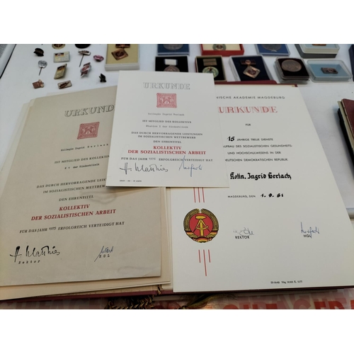 47 - Large Collection of German DDR Awards and Medals complete with Certificates and Other Ephemera. (Pre... 