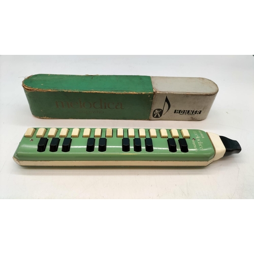 724 - Hohner Melodica. Boxed.