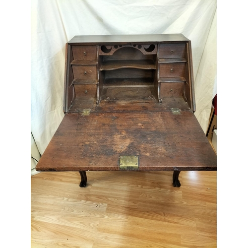 78 - Mid Georgian Oak Bureau on Lion's Paw feet with  Cabriole Legs. 100cm x 78cm x 68cm. This Lot is Col... 