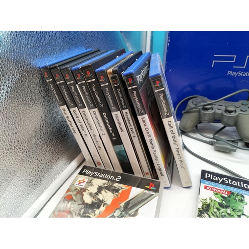 100 - Playstation 2 plus Controllers and Games.