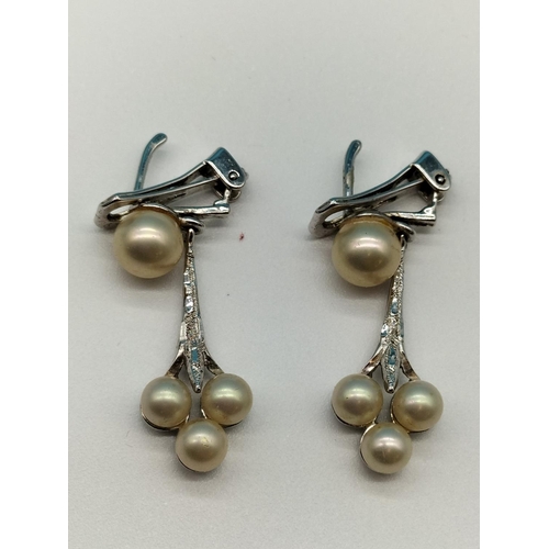 25 - Silver Stone set Ring (Size P) plus 925 Silver Pearl earrings.