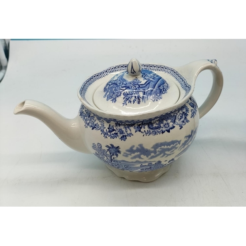 438 - Royal Doulton 'Penny' Figure HN2424, Woods Blue and White Teapot, Toby Jug and Booth's Lidded Circul... 