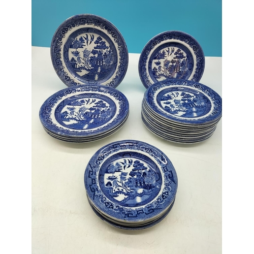 439 - Collection of Staffordshire Blue and White 'Old Willow' Plates (22) - 22cm Diameter x 5, 20cm Diamet... 