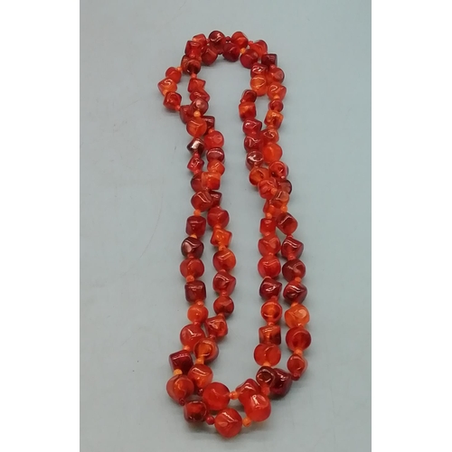 53 - Long 70cm Amber Coloured Flapper Necklace.