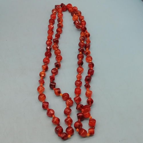 53 - Long 70cm Amber Coloured Flapper Necklace.