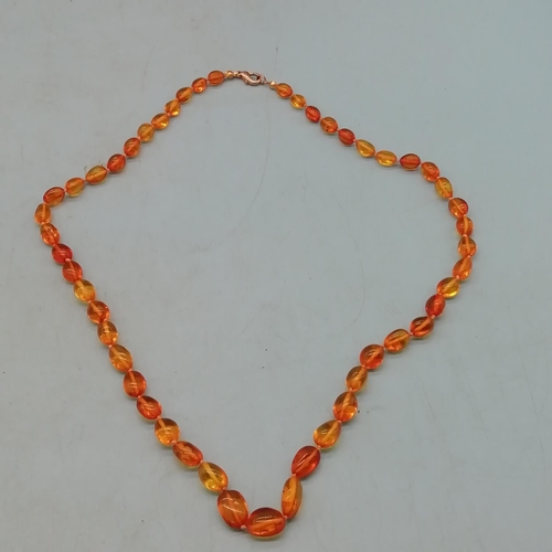 54 - Amber Coloured Necklace. 30cm Long.